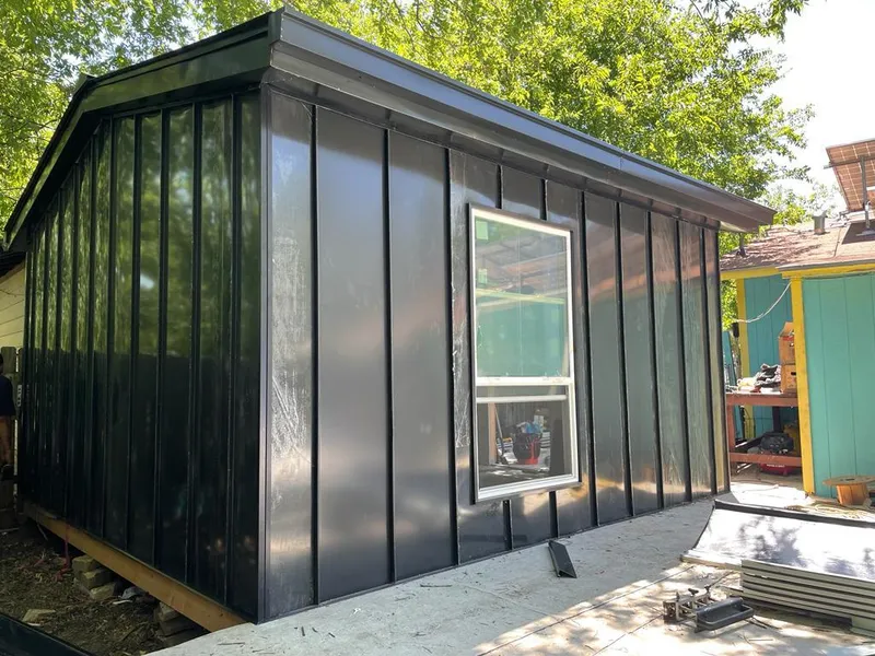 Black standing seam metal wall panels for Roof Inspection in Moapa Valley